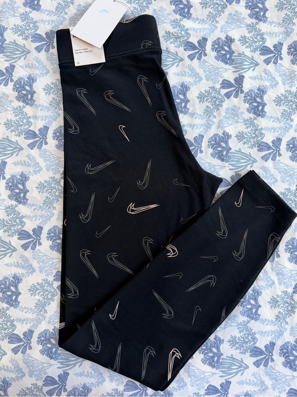 Nike Black Leggings with Subtle Silver Swoosh Accents